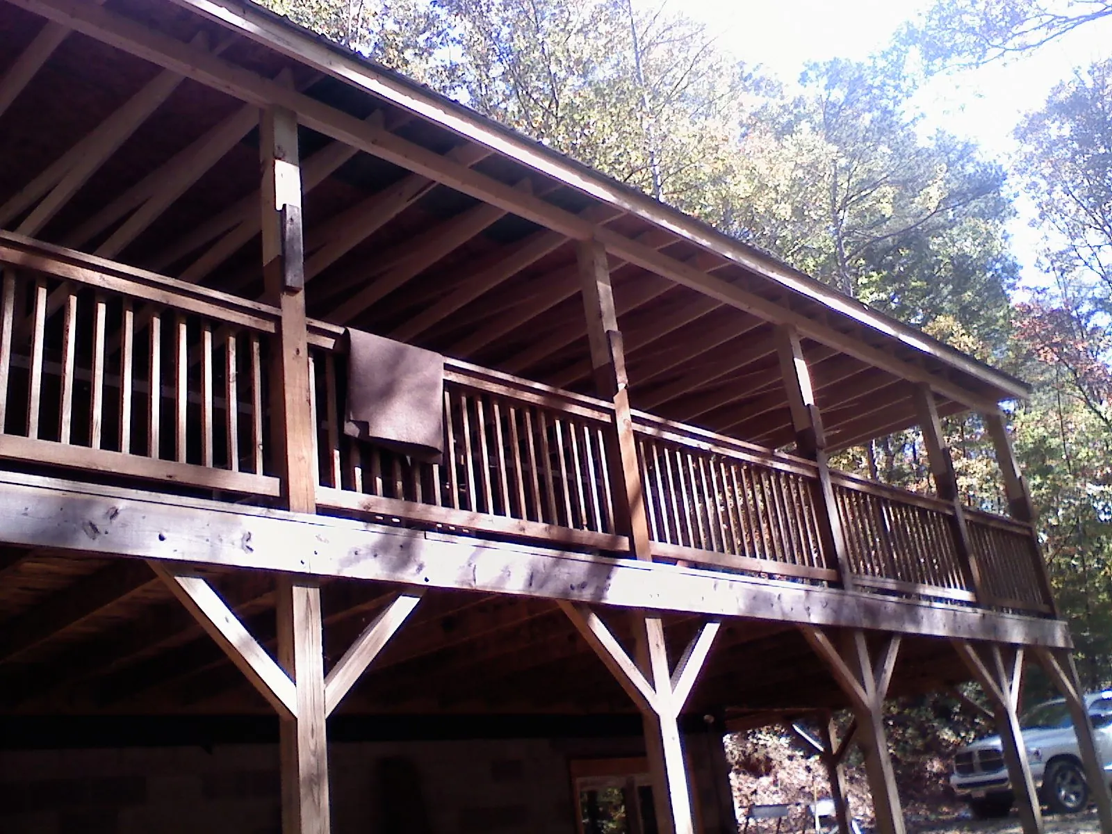 Timber framing under a new elevated porch and deck — Roof Leak Repair in Montevideo by Roofing Brothers